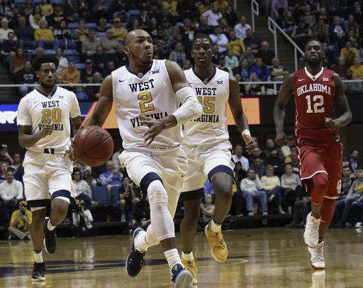 Slideshow: Oklahoma Squeaks Past WVU in Morgantown